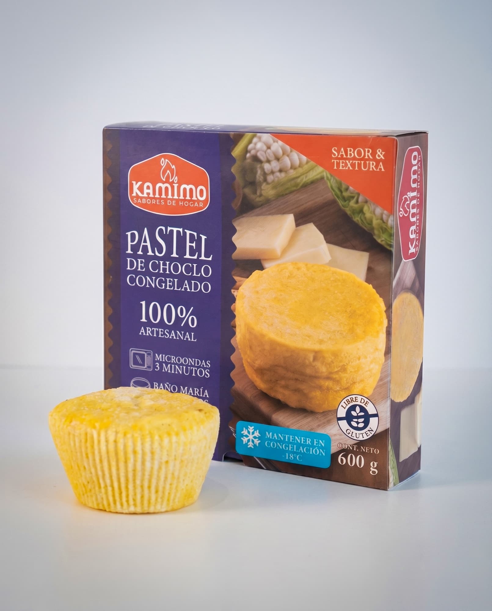 Caja de pastel de choclo Kamimo de 600 g junto a una porción